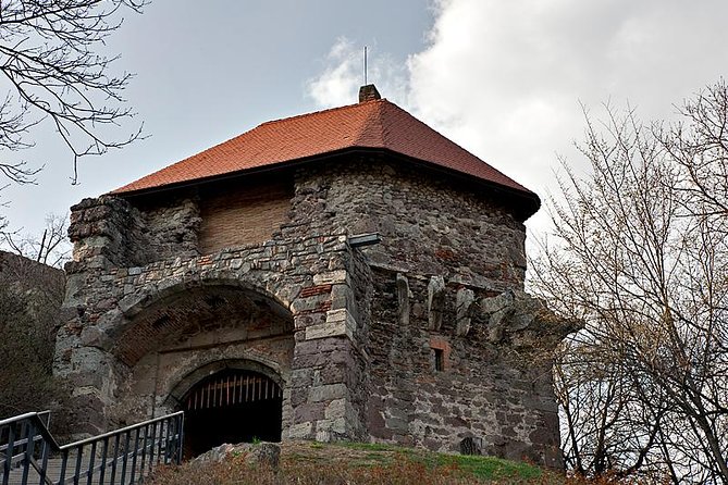 Along the shore of Danube river, private tour - Janos Parish Church: baroque interior, 12th-century sundial, and the catwalk down