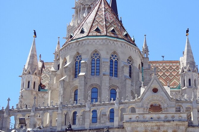 Buda Castle Tour: Fisherman's bastion and hidden gems - Trinity Square monuments: Holy Trinity Column, then the Hadik luck ritual