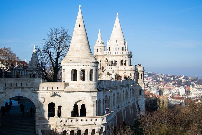 Buda Castle Walking Tour: A Kingdom of Many Nations - Stop 2: the palace as a history timeline, from Mongols to WWII rebuilding