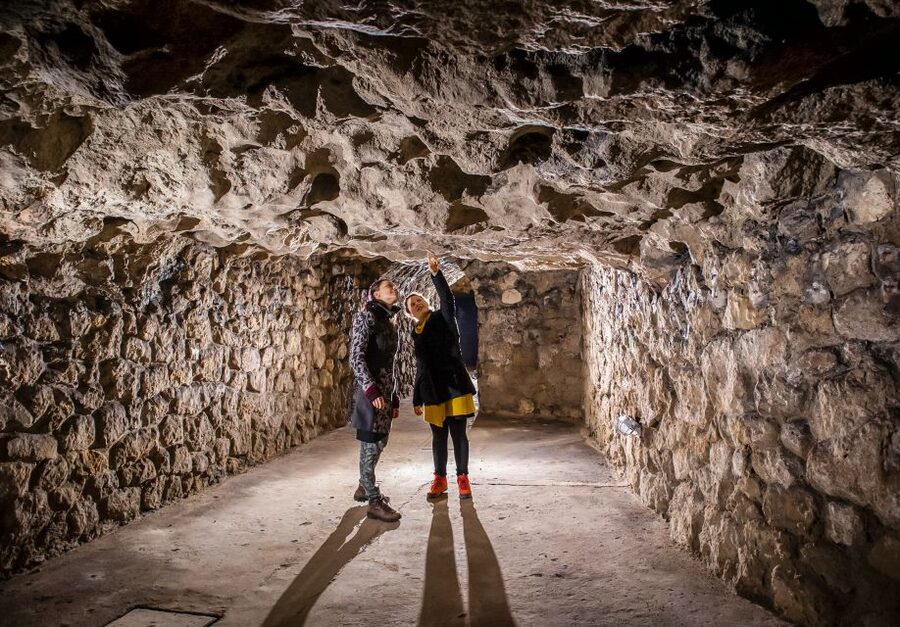 Budapest: Buda Castle Cave Tour - The human timeline underground, wine cellars to shelters to prison