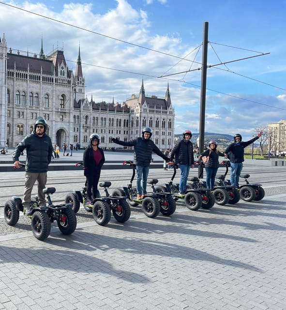 Budapest: Buda Highlights Guided Tour on Electric EZRaider - Crossing the Danube on Freedom Bridge for big views