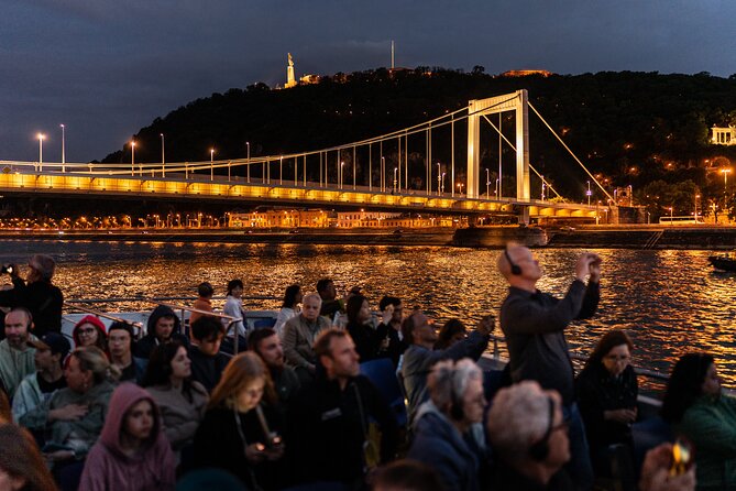 Budapest Danube River Sightseeing Night Cruise with Drink - The Danube route: UNESCO riverbanks, bridges, and two big photo moments