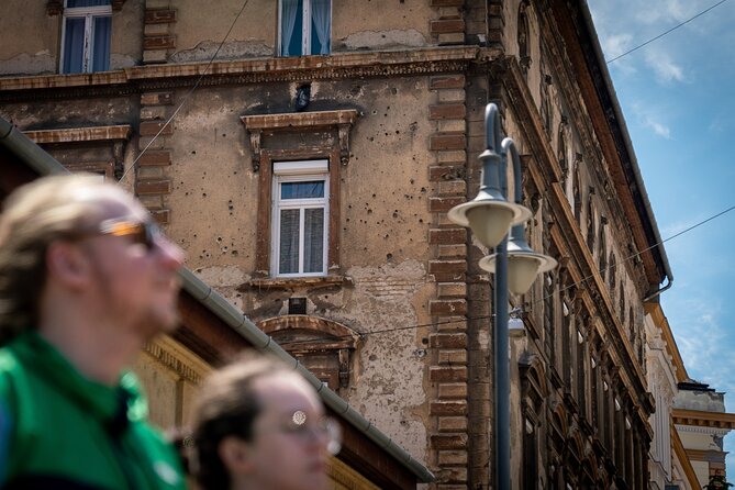 Budapest District 8 Crime and Culture Walking Tour - Mobile ticket, English guide, and small-group pacing