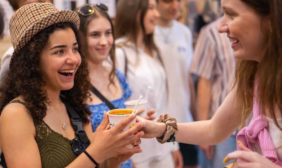 Budapest: Guided Food Tour with Wine, Beer, and Shots - Street food segment in District 7: lángos and Hungarian soup, hands-first