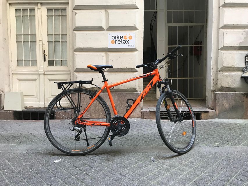 Budapest: Historic Downtown Bicycle Ride with Scenic Views - Városliget and the thermal bath contrast you will appreciate