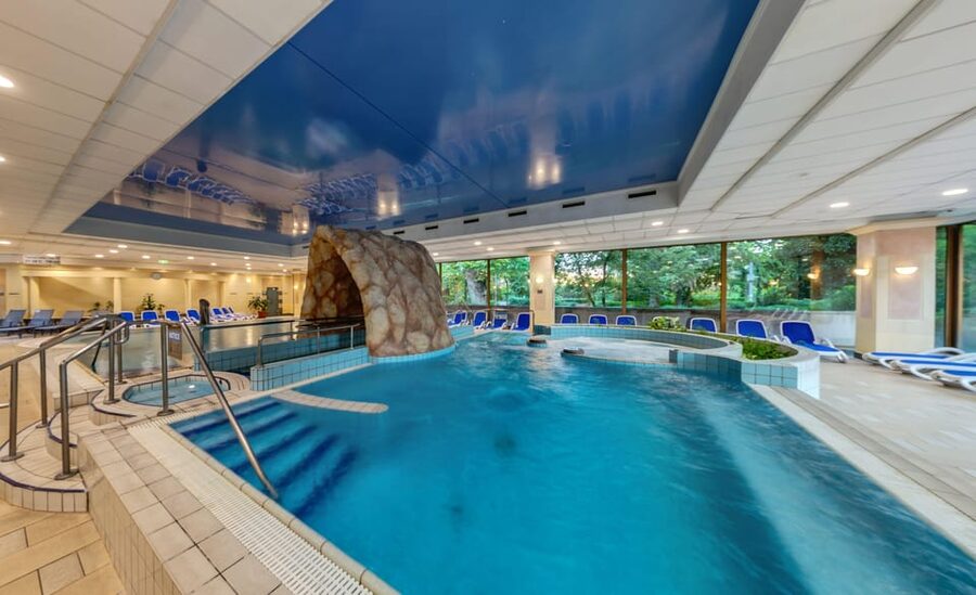 Budapest: Margaret Island Day Spa Entry Ticket - Indoor Views That Make the Soak Feel Like a Scene