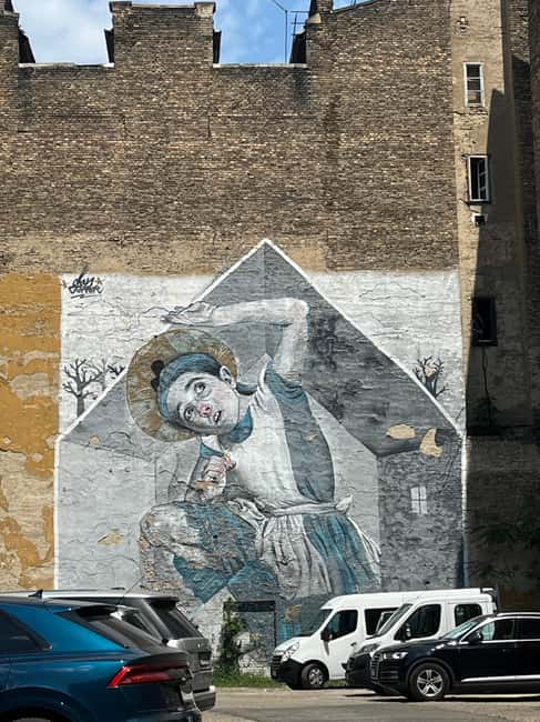 Budapest: Walking Tour with Chimney Cake & Polaroid Photos - Street art on Budapest walls, where the city shows its other face