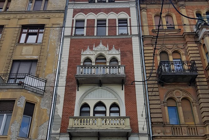 Budapest Walking Tour with Your Private Guide: 20+ Highlights - The Castle District: escalators, Royal Palace framing, and Matthias Church
