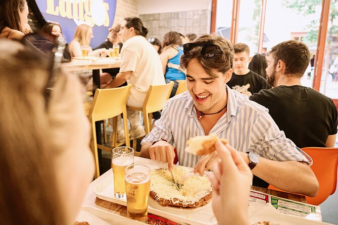 Central Budapest Food Walking Tour with Drinks Included - The food lineup: soup, Hungarian stews, paprikash, pálinka, and Tokaji desserts