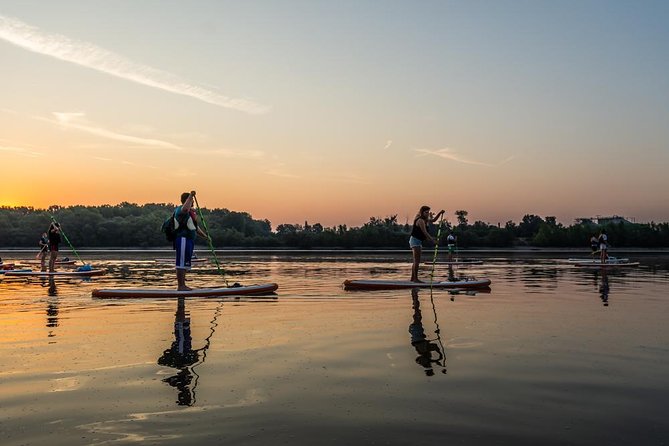 SUP Budapest: Sunset tour - The view payoff: islands, Parliament, and bridges in last-light