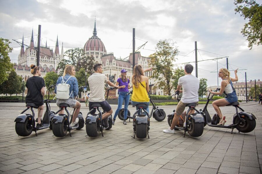 Top sights of Pest downtown on e-scooters incl. Parliament - Meeting point at Deák Ferenc tér, and what to look for